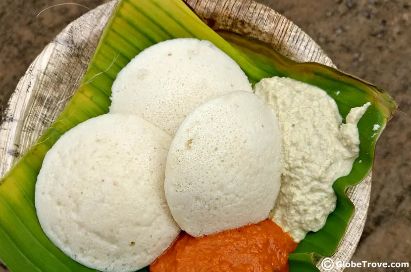 Idli with chutney served at the side