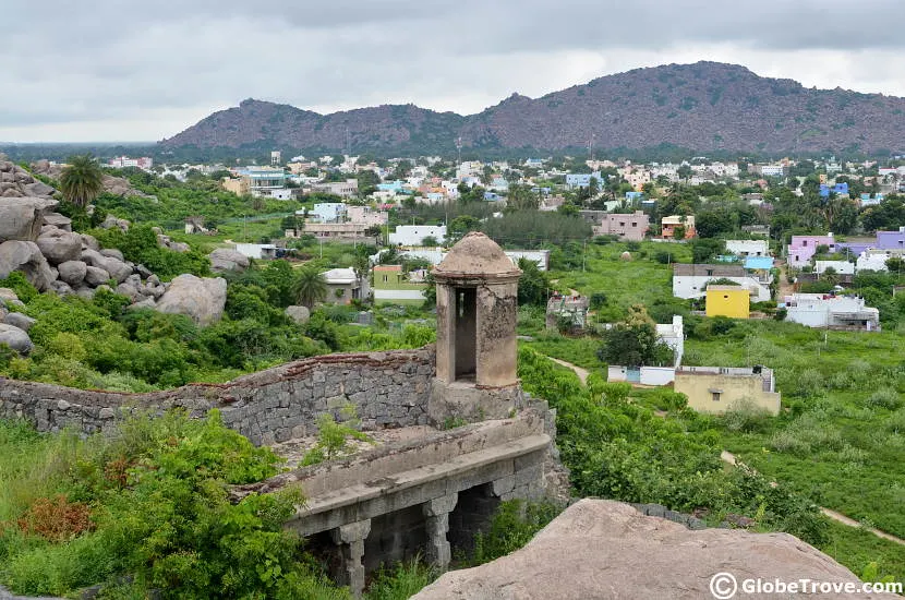A view from the top of Gingee fort which includes the hills in the background and the houses in the foreground. This was one of our stops during our Bangalore to Pondicherry road trip.