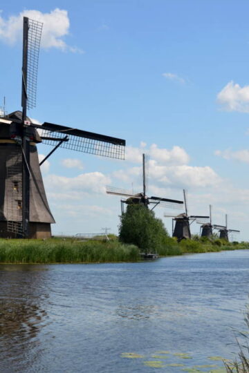 Visiting Kinderdijk: 19 Windmills & A Dutch Legend That Will Curl Your Toes 11 Kinderdijk on a clear summer day