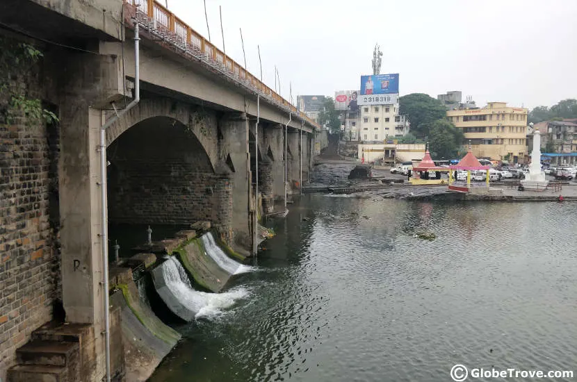 A glimpse of the bridge from the banks of the river.