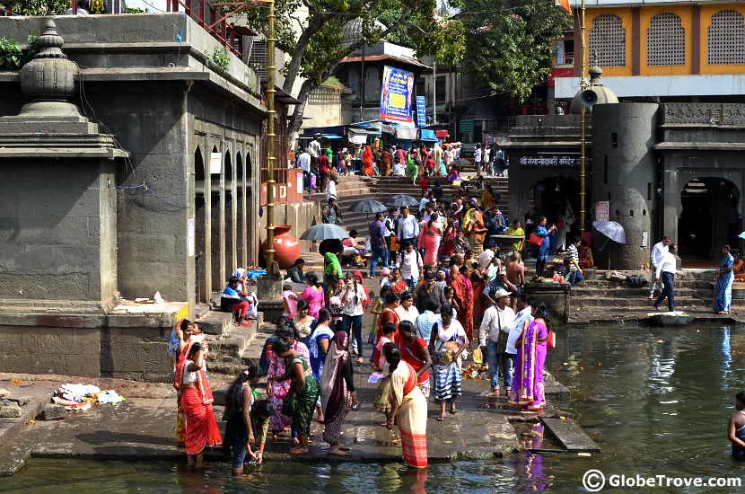 The crowds at the main temple area next to the river.