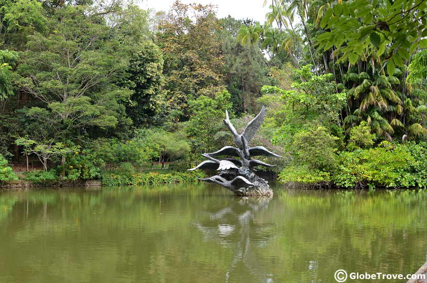 The statue in the centre of swan lake in the Singapore Botanic Gardens.