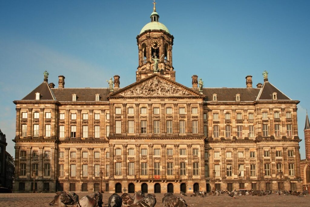 Stop and admire the façade of the Royal Palace even if you don't intend to enter it during your weekend in Amsterdam