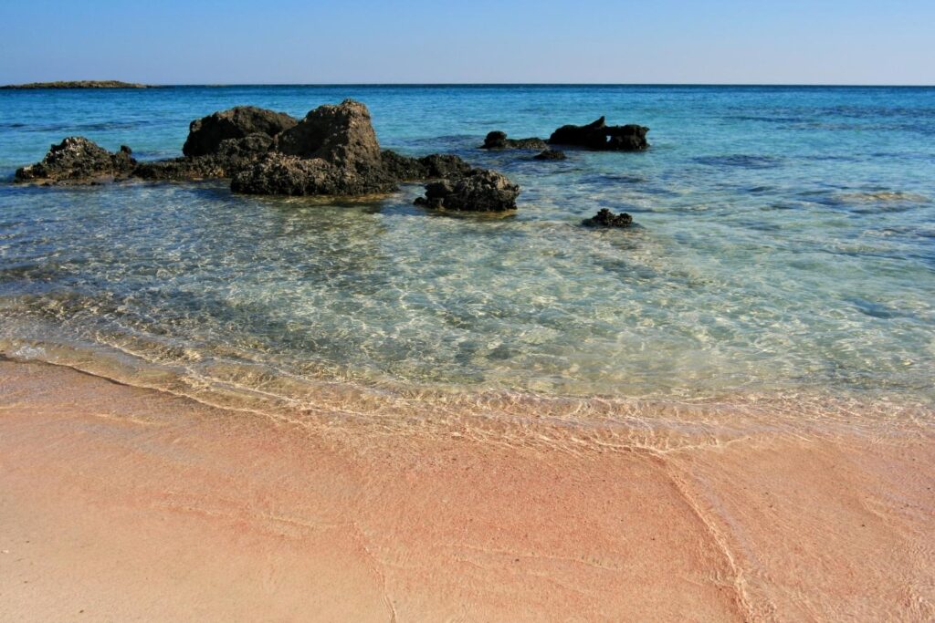 Pink beach in Crete is a unique experience.