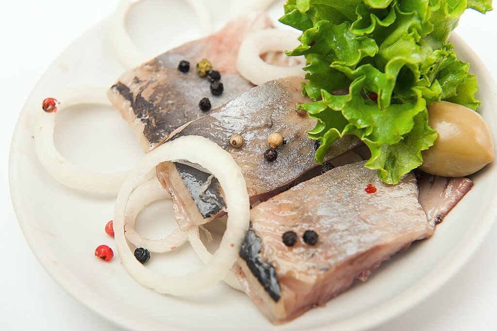Pickled herring are the perfect souvenirs from Amsterdam for foodies.