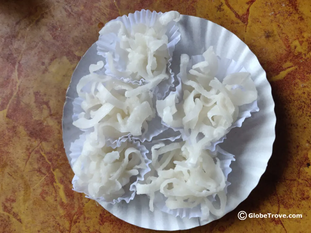 Note the delicate coconut curls in this pretty Goan Christmas sweet.