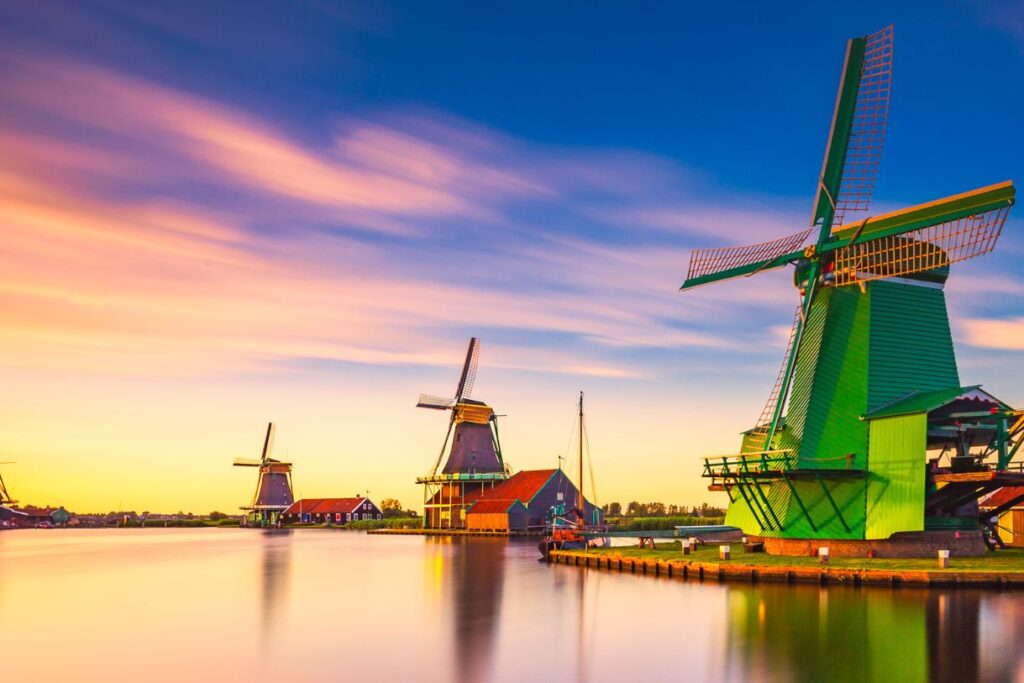 The colorful windmills in Zaanse Schans can be combined with some of the Amsterdam tulip tours.