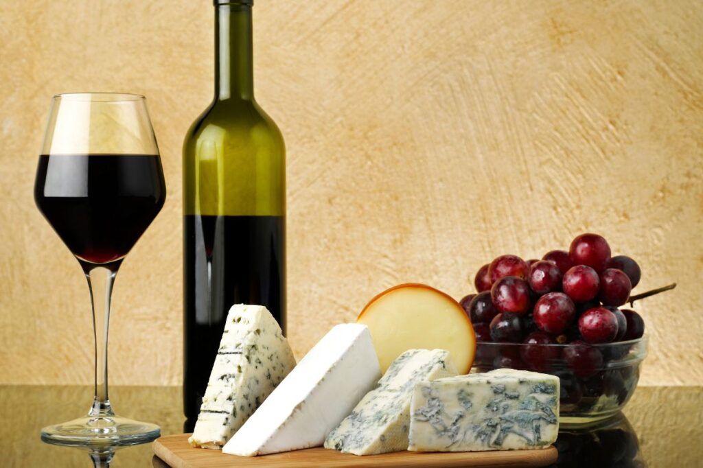 Wine and cheese arranged together at one of the wine regions in California.