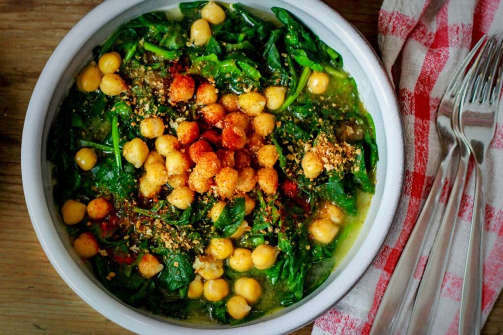 Spinach and chickpeas in a bowl are one of the best tapas in Andalucia.
