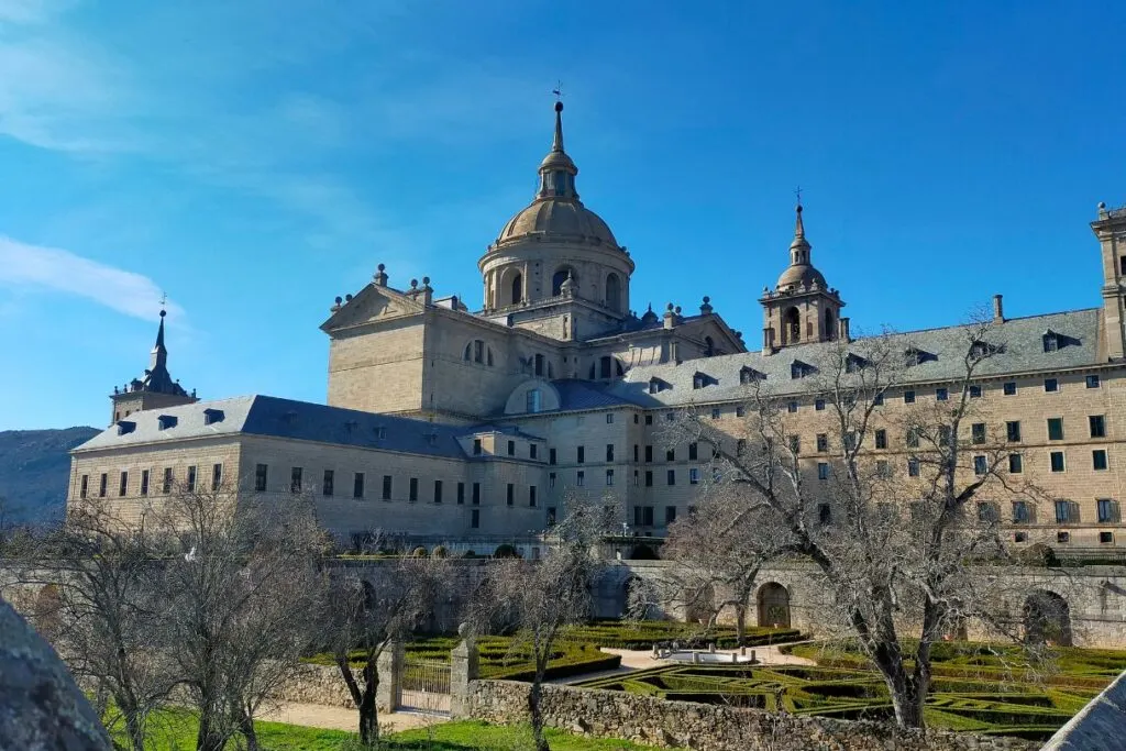 Monasterio de San Lorenzo de El Escorial and a view of its gorgeous gardens and maze.