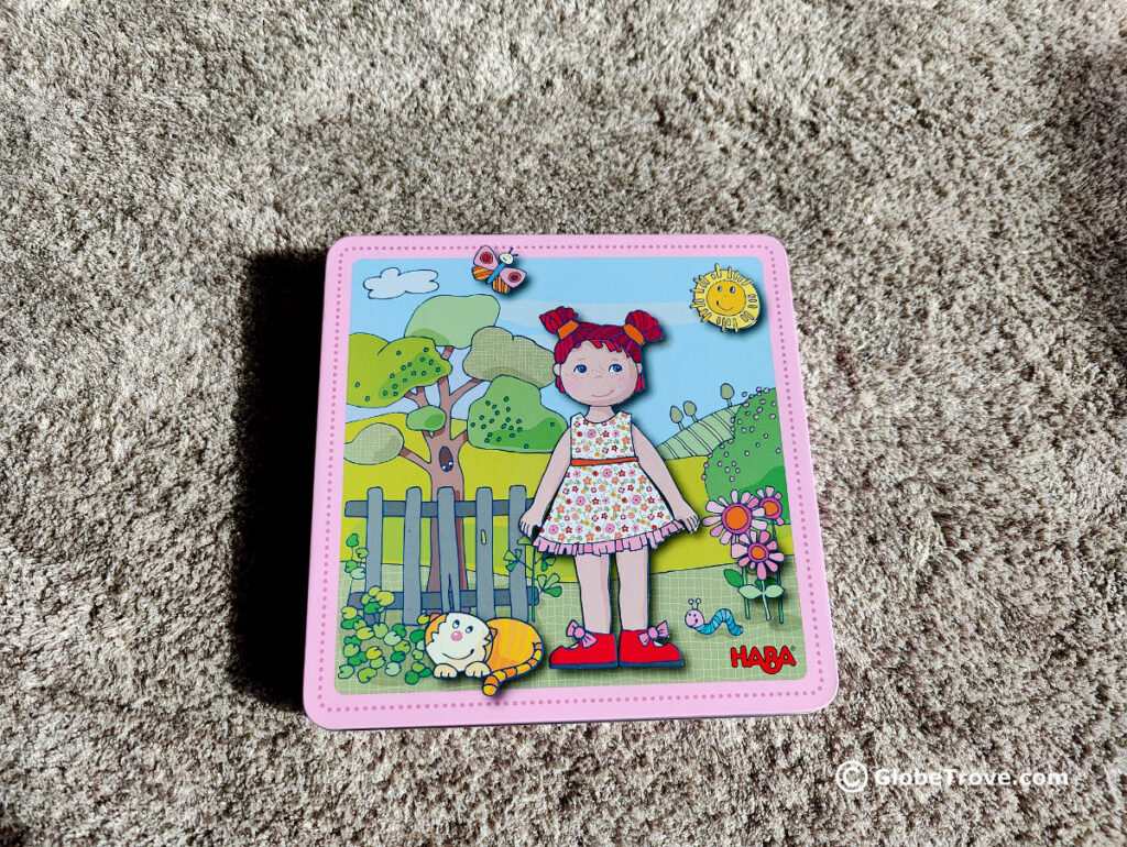 The magnetic box of the HABA Dress up doll magnetic travel game