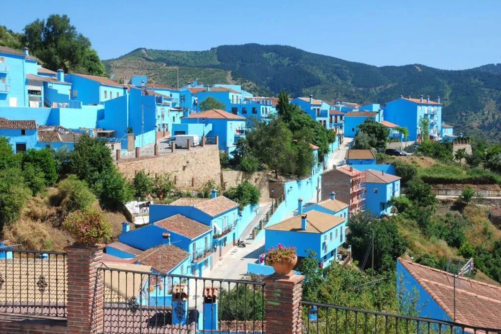 Colorful blue buildings in Juzcar which is known as the Smurf village which is one of the attractions that draws people to Malaga.