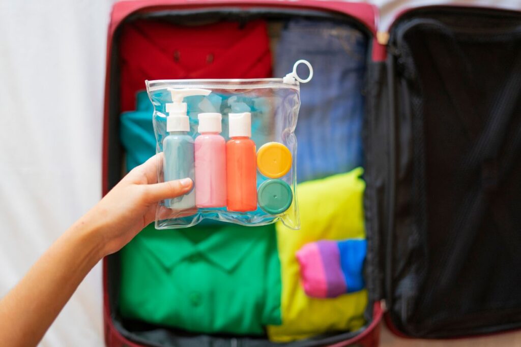 Small colorful reusable bottles to pack toiletries in when you travel and pack for Hawaii.