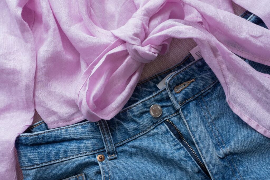 Pink cotton blouse with denims are the true answer to the question what to wear in Italy in summer. 