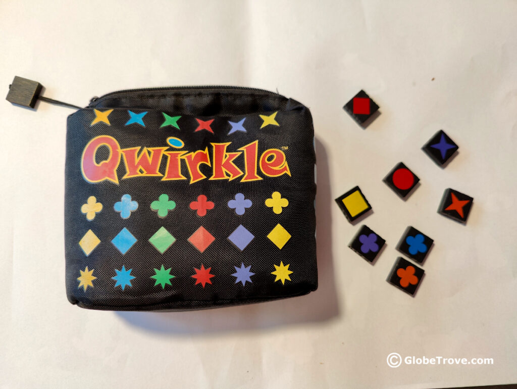 Qwirkle with its colorful tiles is one of the smallest travel board games.