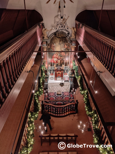 A view of the Our Lord in the Attic museum  from above and the painting below.