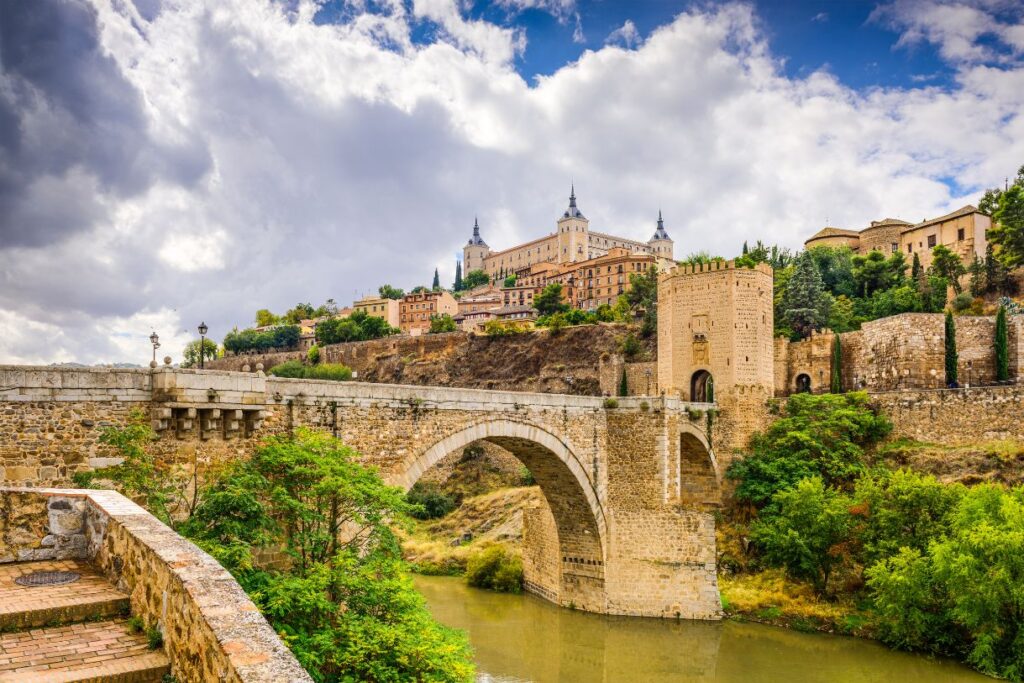 The bridge and Toledo in the distance. One of the cool weekend breaks in Spain.